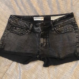 Bullhead black wash denim shorts with studs